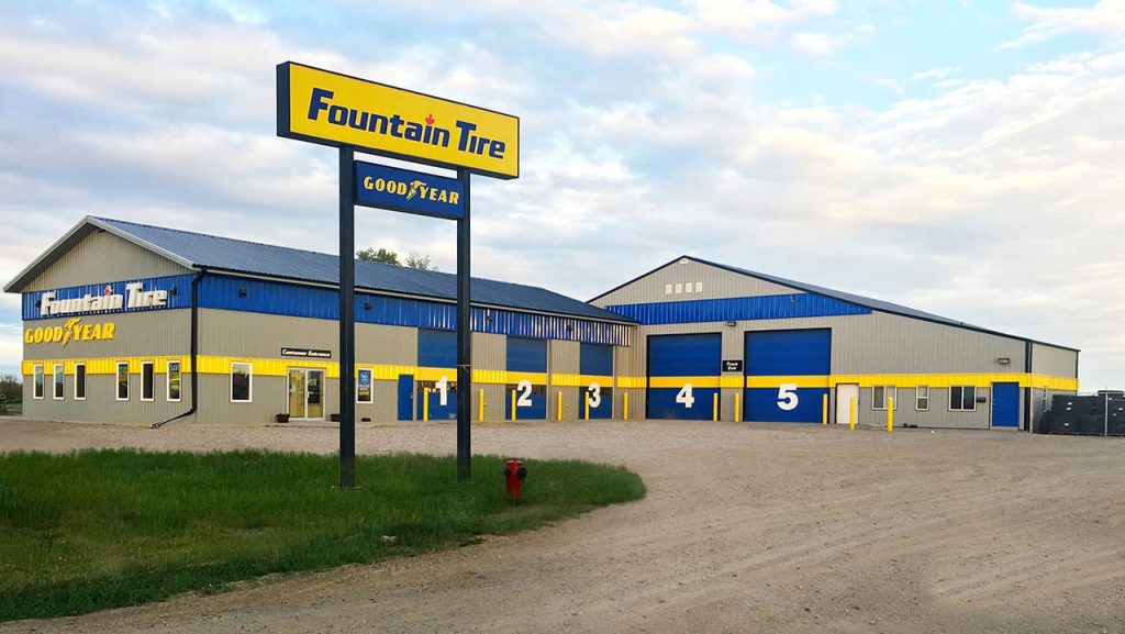 Post-frame commercial building by Integrity Post Structures Fountain tire