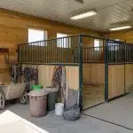A Charcoal Steel post-frame horse Barn