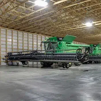 A bright white post-frame agricultural shop