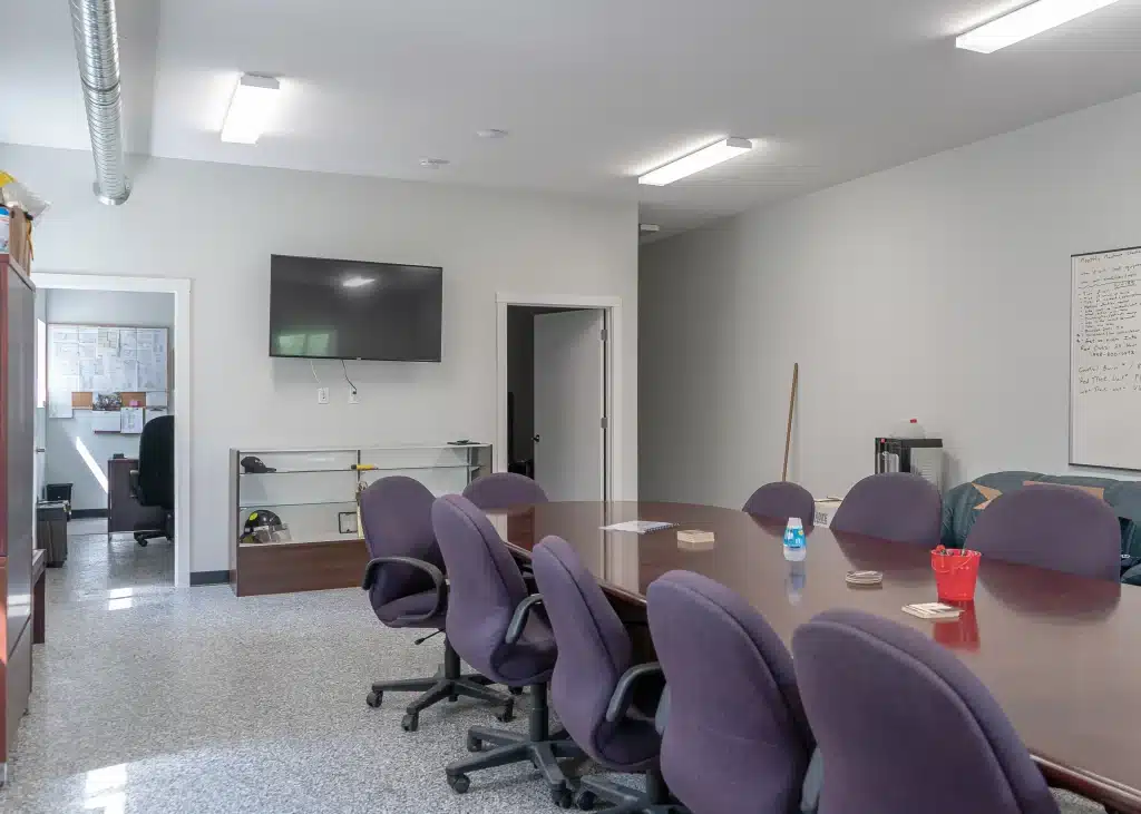 Bright white post-frame commercial Fire Hall