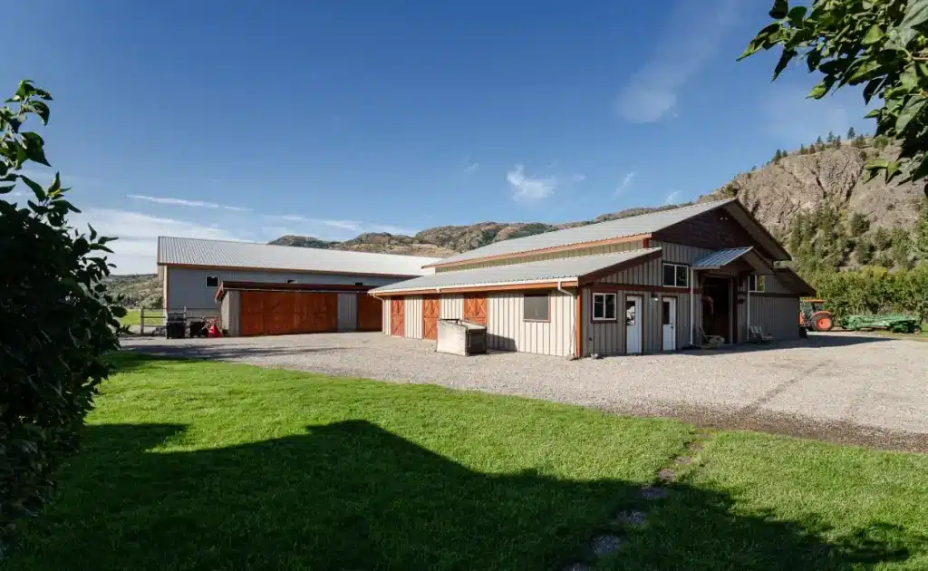 A Stone Grey post-frame equestrian Riding Arena