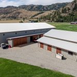 A Stone Grey post-frame equestrian Riding Arena