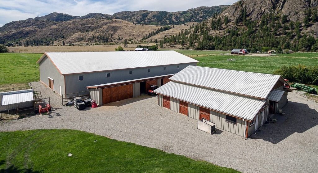 A Stone Grey post-frame equestrian Riding Arena