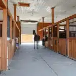A Stone Grey post-frame equestrian Riding Arena