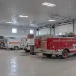 Bright white post-frame commercial Fire Hall