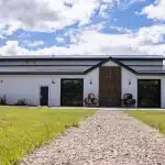 A bright white post-frame community centre