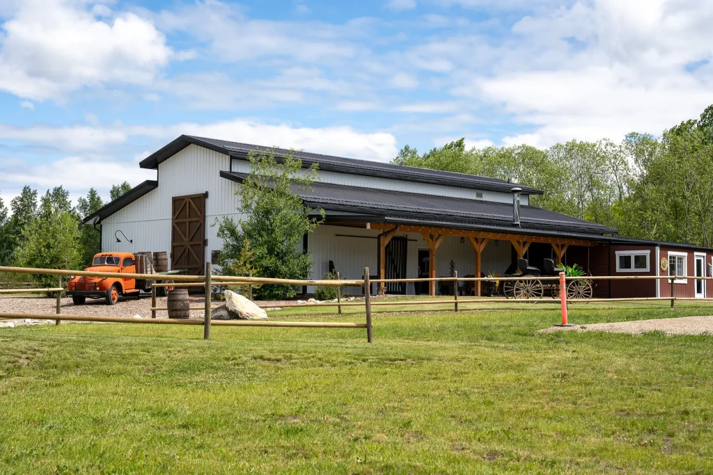 A bright white post-frame community centre