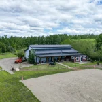A bright white post-frame community centre