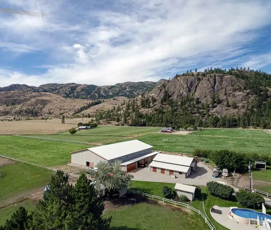 A Stone Grey post-frame equestrian Riding Arena