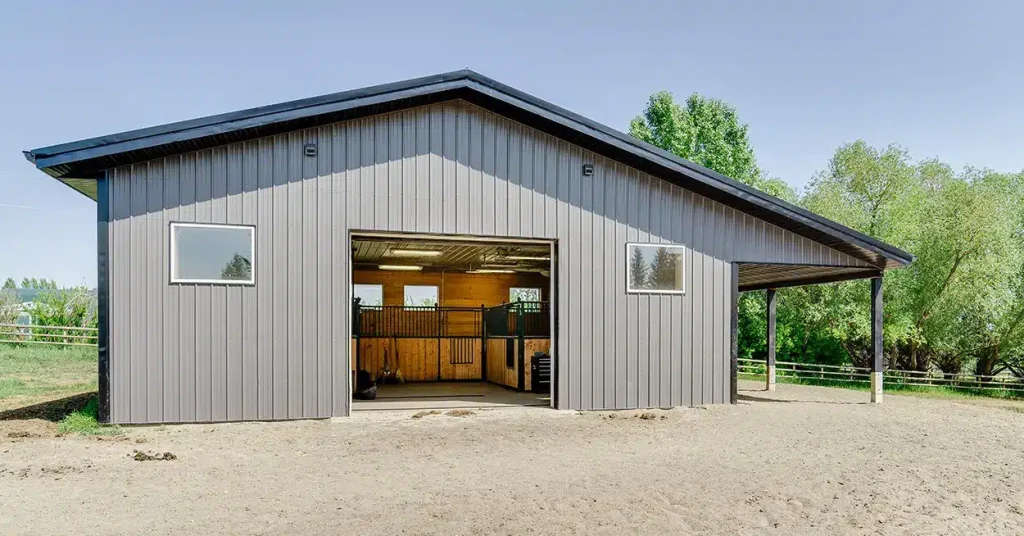 A Charcoal Steel post-frame horse Barn