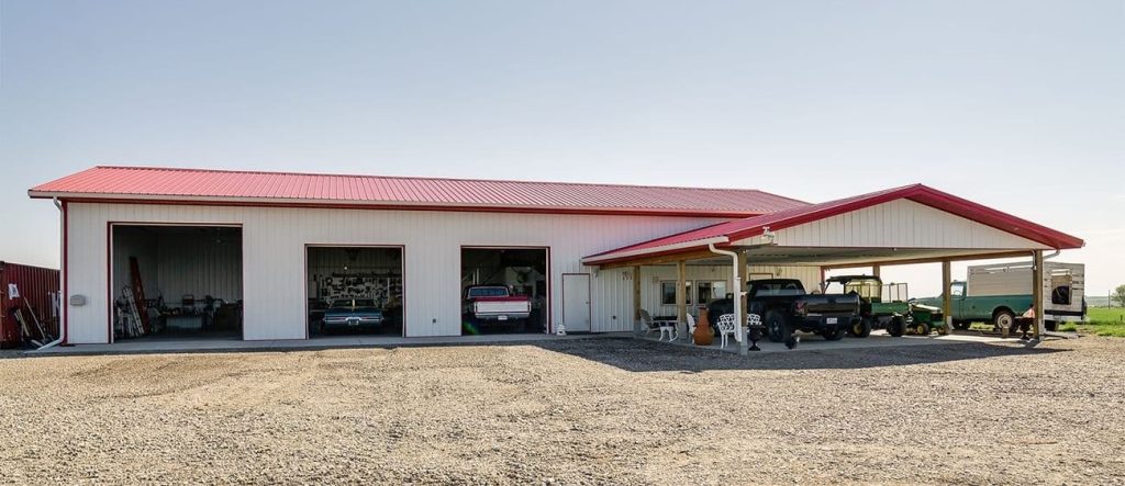 A bright white post-frame lifestyle & hobby shop
