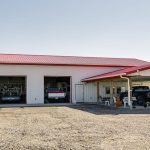 A bright white post-frame lifestyle & hobby shop