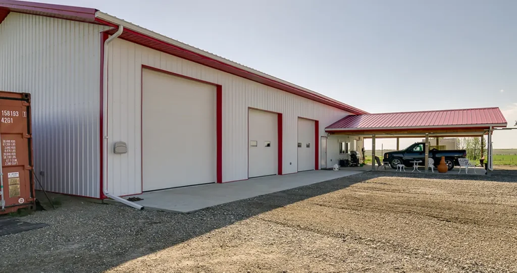 A white post-frame lifestyle & hobby shop