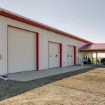 A white post-frame lifestyle & hobby shop