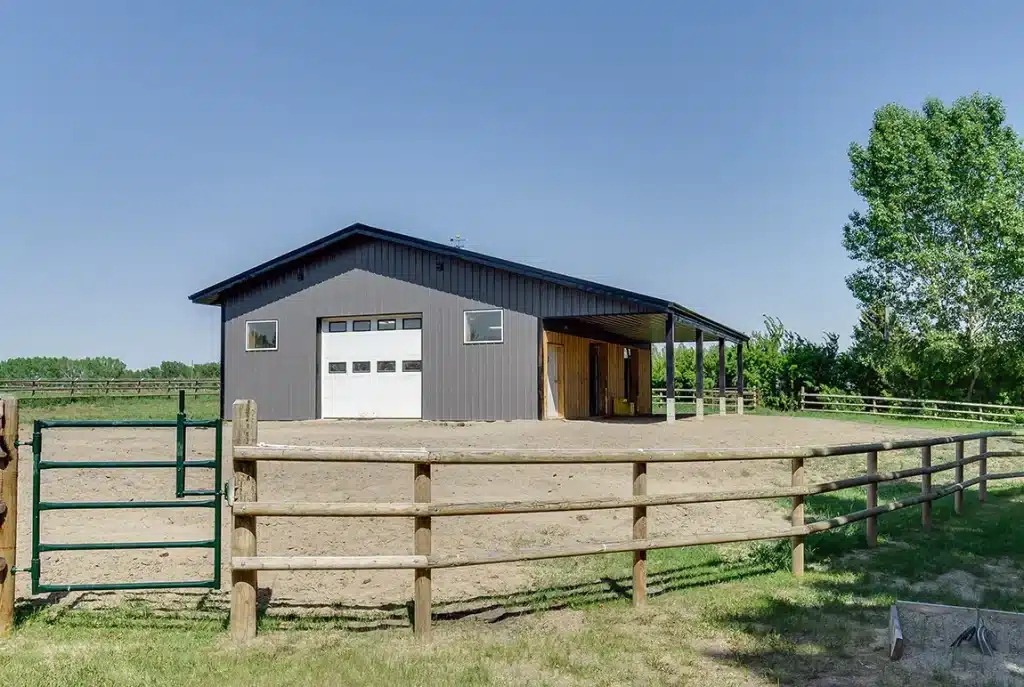 A Charcoal Steel post-frame horse Barn