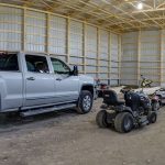 A charcoal lifestyle & Hobby post-frame shop with one chain overhead door