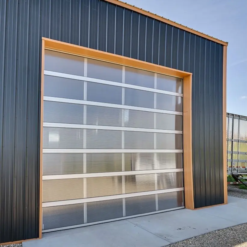 A copper penny agricultural post-frame shop with a bi-fold door