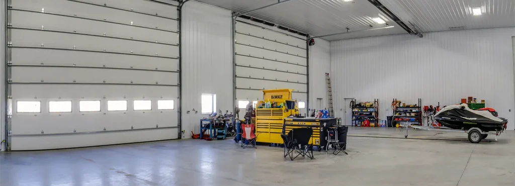 A bright white post-frame agricultural shop