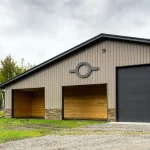 A buckskin post-frame equestrian barn