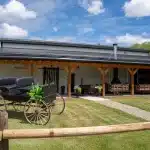 A bright white post-frame community centre