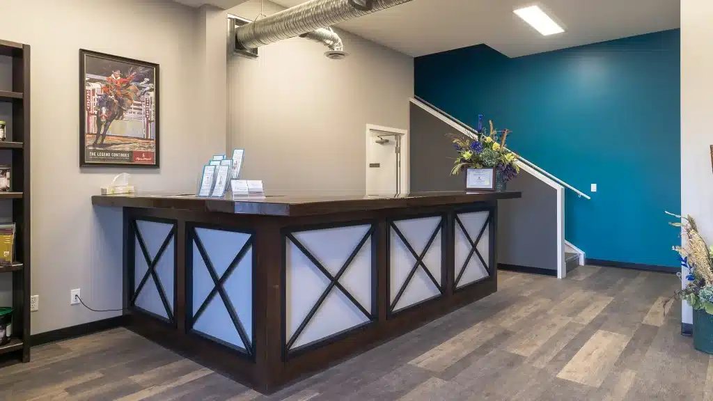 A charcoal post-frame commercial building