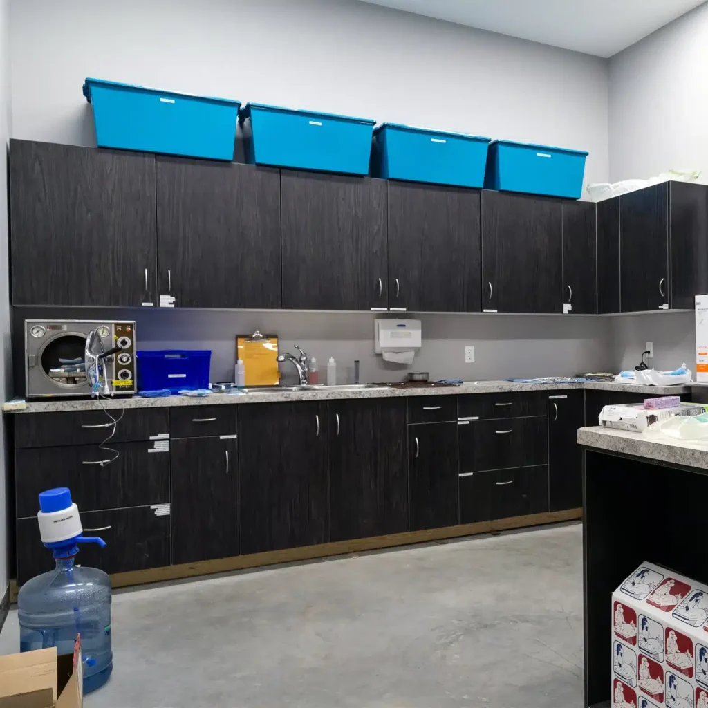 A charcoal post-frame commercial building