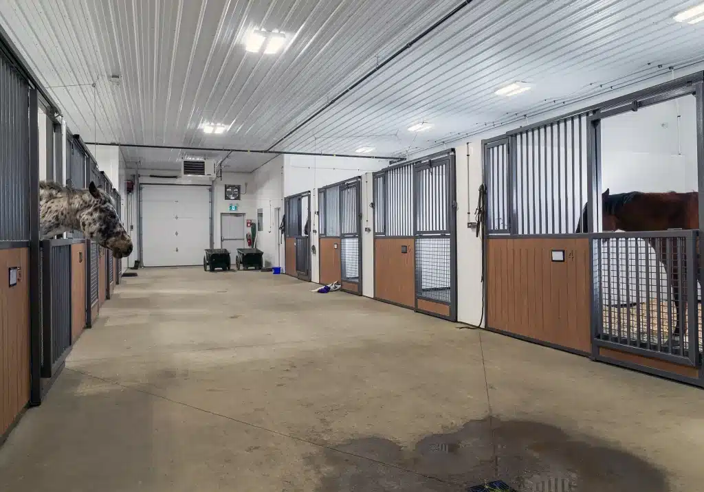 A charcoal post-frame commercial building