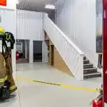 Interior of a dark red post-frame commercial fire hall