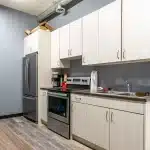 Interior of a dark red post-frame commercial fire hall