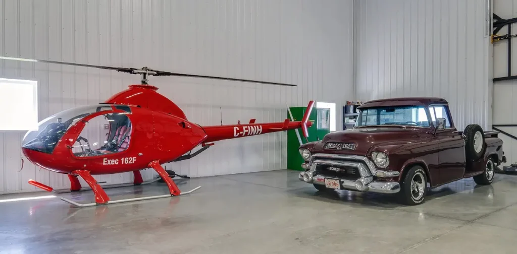 A bright white post-frame agricultural shop