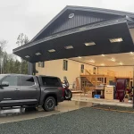 A black post-frame hangar