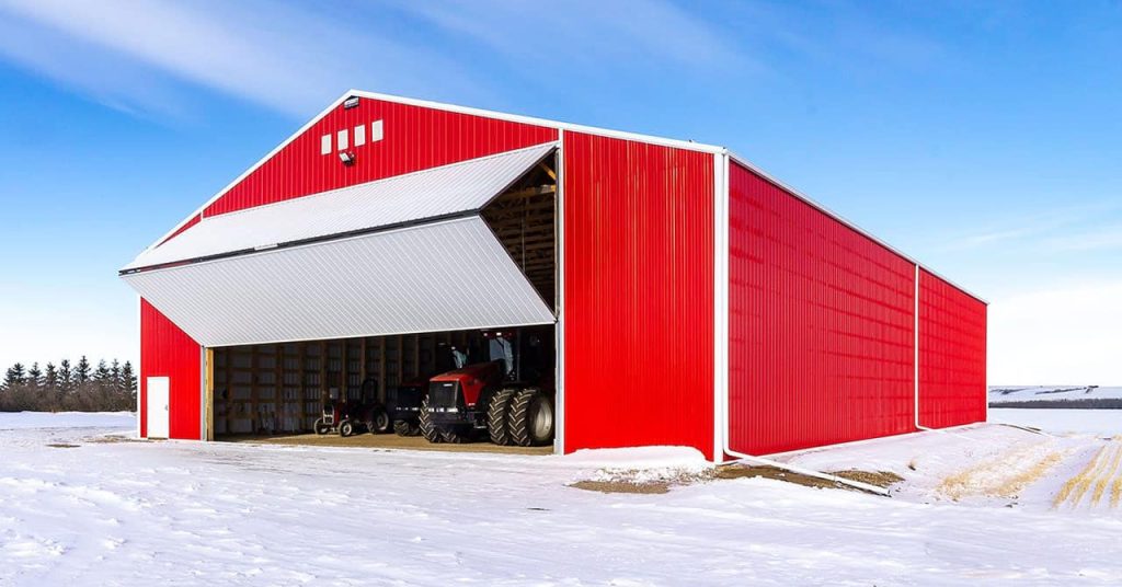 red post-frame machine shed by Integrity post structures