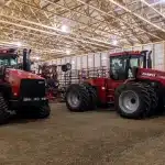 red post-frame machine shed by Integrity post structures