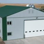 A post-frame agricultural shop with overhead door