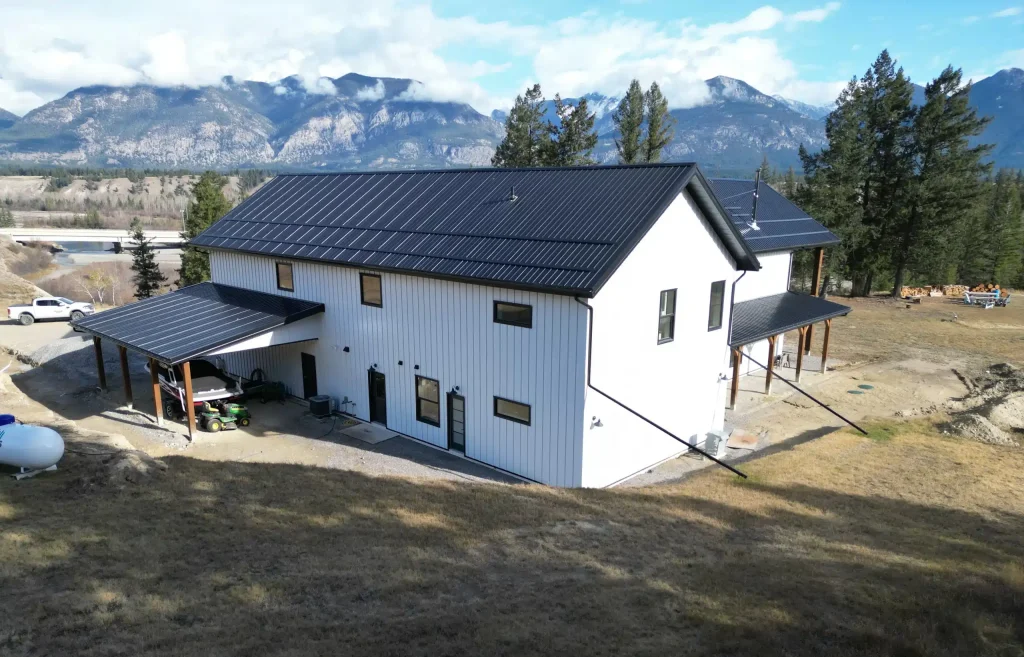 A white white post-frame barndominium