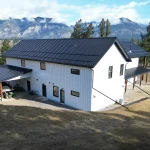 A white white post-frame barndominium