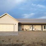 A galvanized post-frame highwood with garage