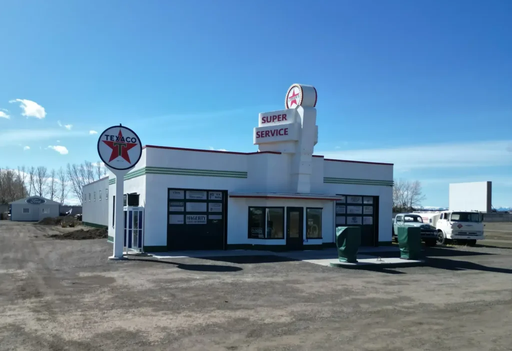 A white white post-frame Agricultural shop and museum.