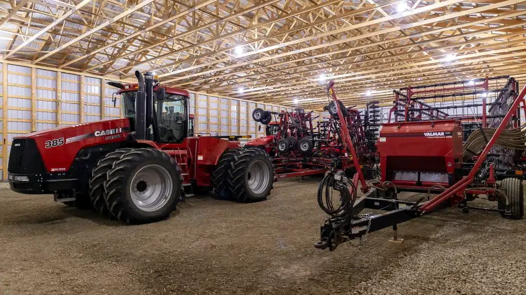 red post-frame machine shed by Integrity post structures