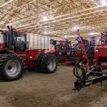 red post-frame machine shed by Integrity post structures