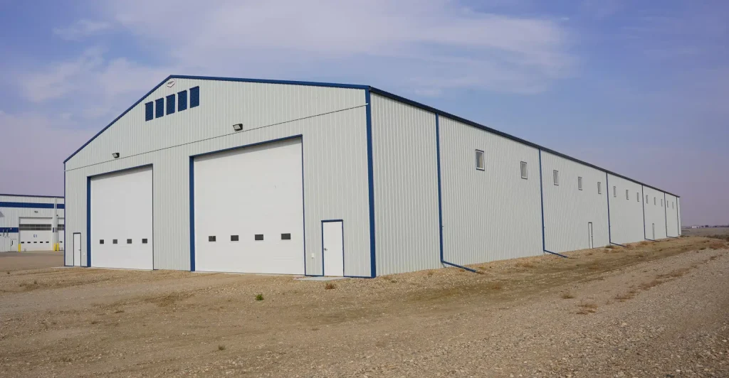 A Bone White post-frame agricultural storage building