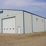 A Bone White post-frame agricultural storage building