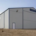 A Bone White post-frame agricultural storage building