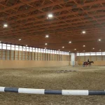 A post-frame equestrian Private Riding Arena