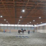A post-frame equestrian Private Riding Arena