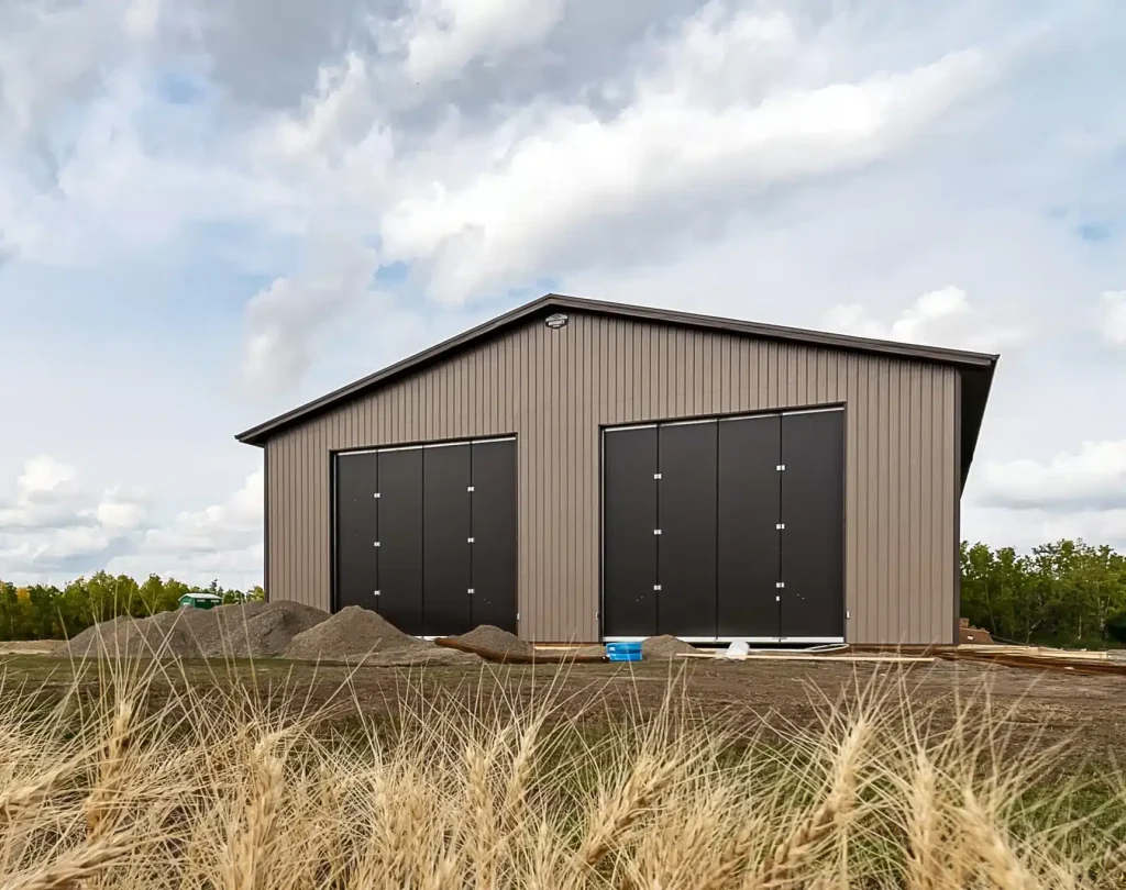 A buckskin post-frame agricultural storage building with findoors