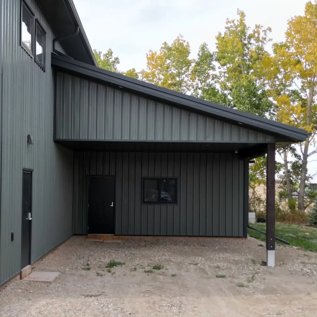 A post-frame agricultural shop