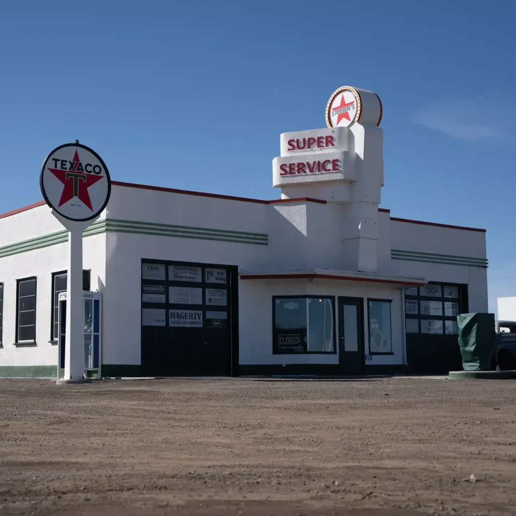 A white white post-frame Agricultural shop and museum.