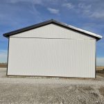 A white white post-frame lifestyle & hobby shop with premium wainscoting