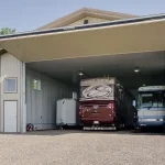 A light stone post-frame lifestyle & hobby shop with a bi-fold door and dark brown roof